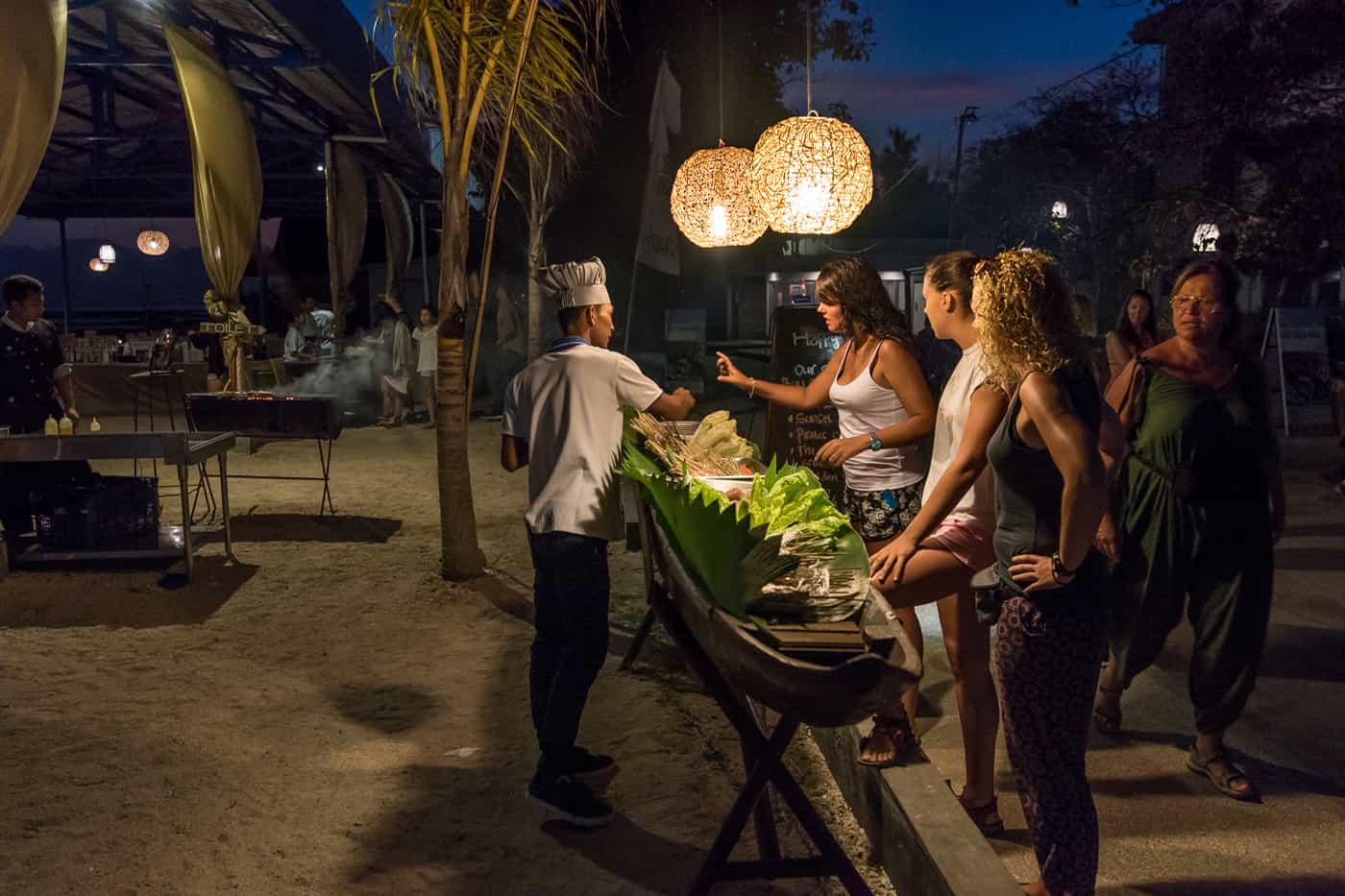 Sunset beach barbeque at Hotel Ombak Paradise in the Gili Islands of Lombok Indonesia